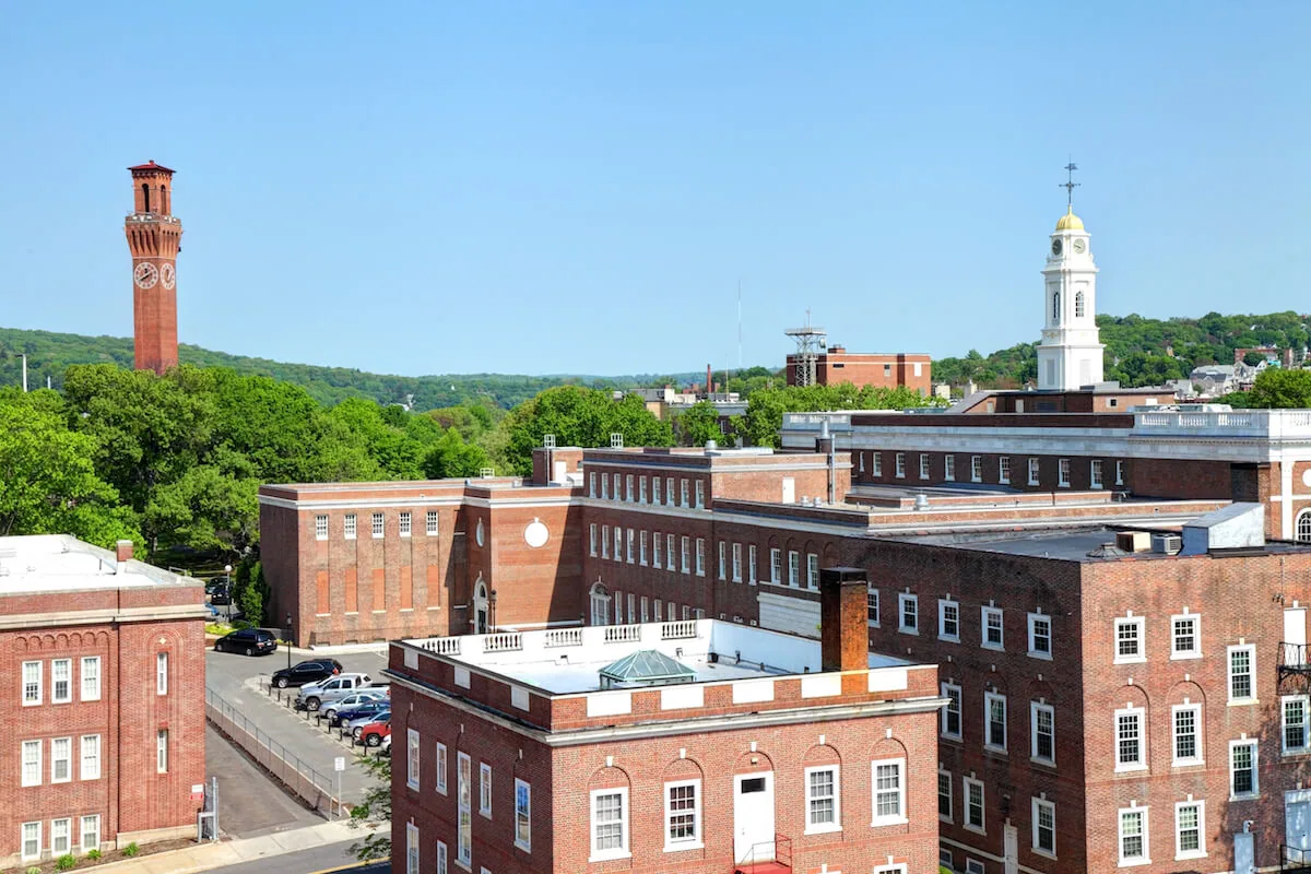 Brick commercial buildings and clock tower in Waterbury